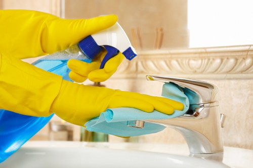 Deep upholstery cleaning removing stains from a fabric sofa
