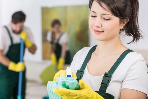 Carpet cleaning staff using protective equipment during a service